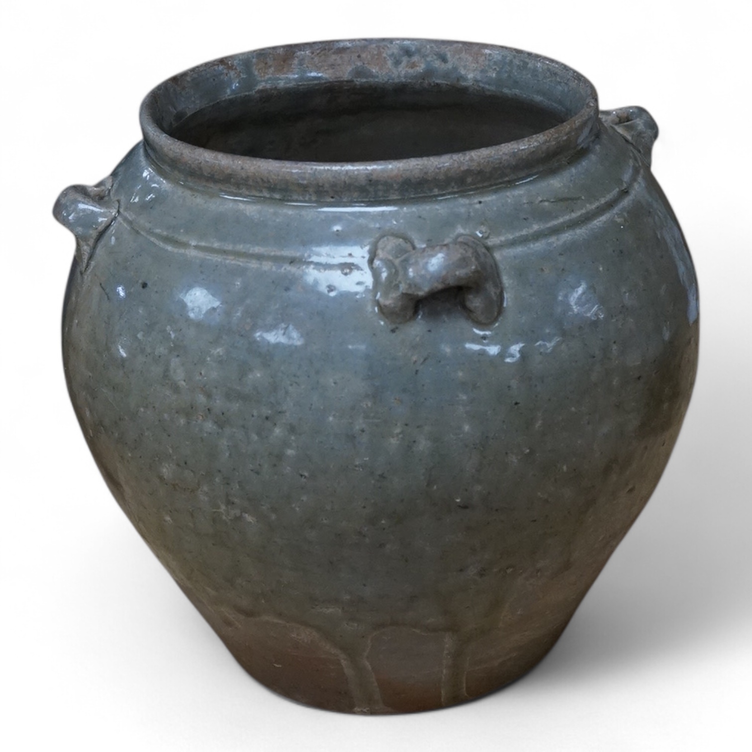 A Chinese olive green glazed jar, Tang Dynasty, 13cm